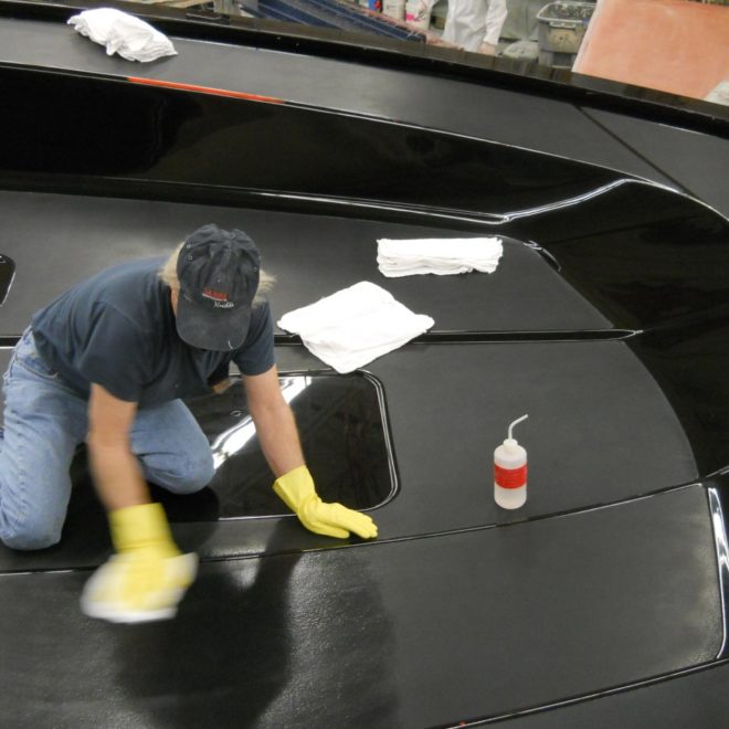 Applying wax to mold