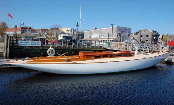 Restored 1902 Buzzards Bay 30 docked at the Belfast Bay