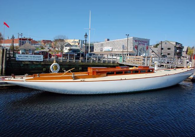 Restored 1902 Buzzards Bay 30 docked at the Belfast Bay