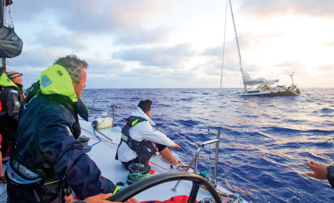 Owner Les Crane and his crew looked on as his boat Monterey sinks during the 2017 Antigua to Bermuda Race.