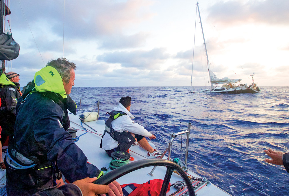 Owner Les Crane and his crew looked on as his boat Monterey sinks during the 2017 Antigua to Bermuda Race.