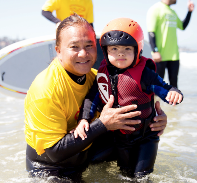 Guy Takayama with one of his students