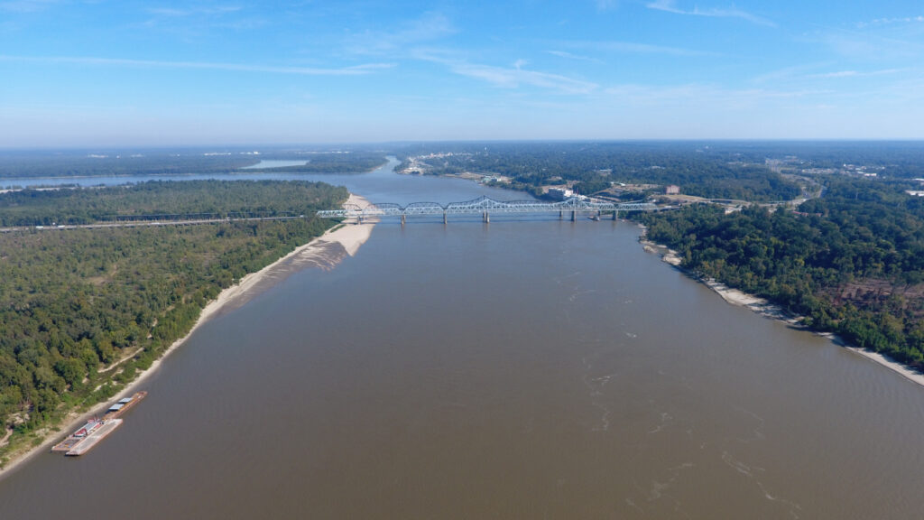 An aerial drone photo of the Mississippi River near Vicksburg, MS, looking Northeast at the I-20 bridge, the confluence of the Yazoo River is in the foreground. This picture was taken by a drone flown by Jim Alvis and Mike Manning of the USGS in the fall of 2016. (Jim Alvis and Mike Manning/USGS) Photo by NOAA.