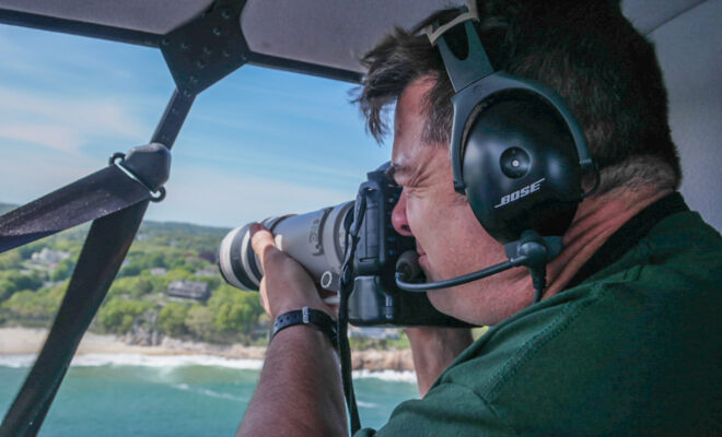 Dave Cleaveland Shooting Out of Helicopter by Maine Imaging.