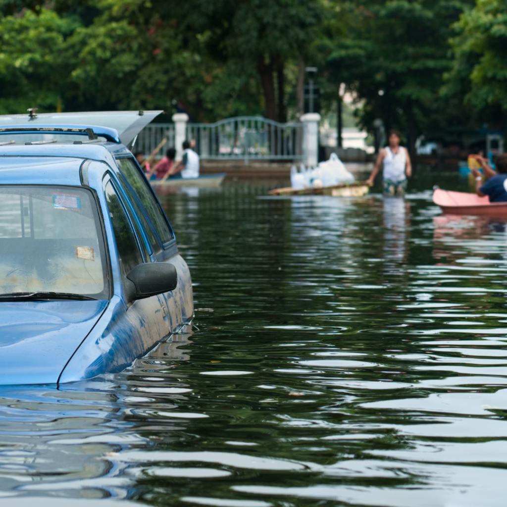 Car stranded by flood. Image royalty free from Canva.com