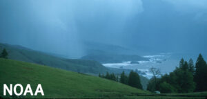 A storm darkens the sky at the mouth of the Russian River, north of Bodega Bay, Calif. The storm was driven largely by an "atmospheric river" over California. (NOAA)