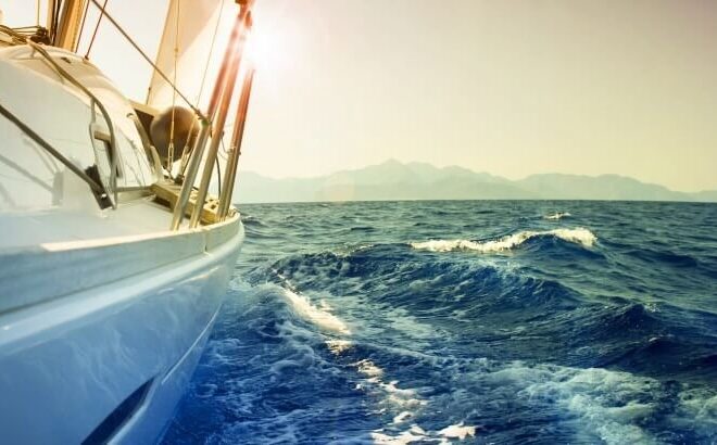 Yacht Sailing Downwind at Sunset