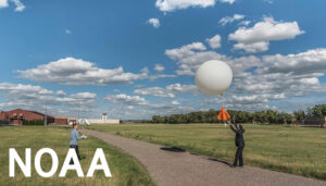 A NWS weather balloon fitted with a radiosonde launches in Bismarck, North Dakota, on June 24, 2017 by NOAA.