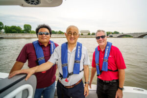 Suzuki Marine Vice President Kuniko Wahira, Suzuki Marine President Nobuo Suyama and Suzuki Marine Executive Vice President Gus Blakely on the boat after arrival.
