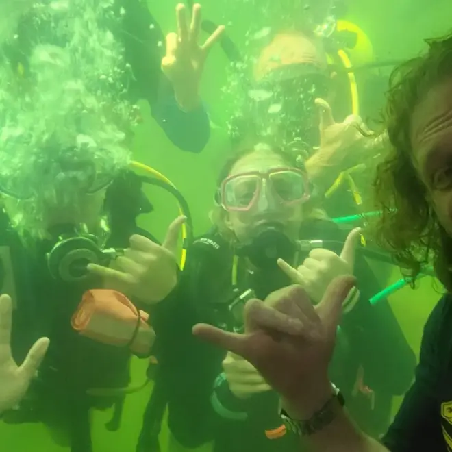 Joseph Dituri is pictured with young divers Courtesy Of The University Of South Florid