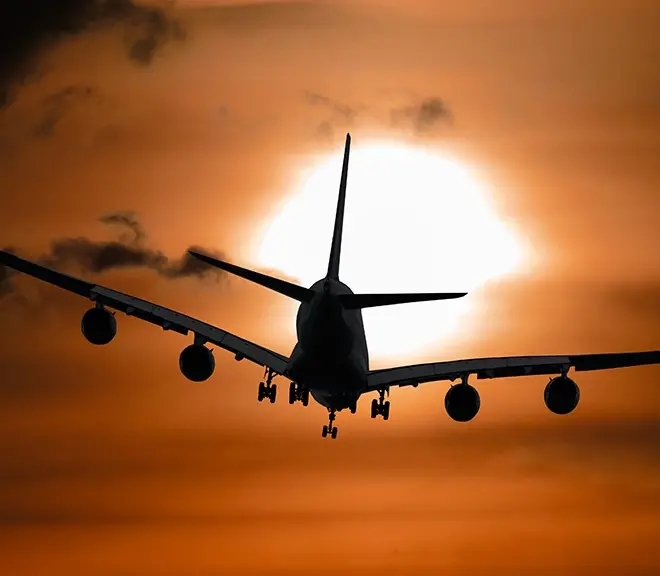 Shadow image of a plane flying at sunset. Climate change may make future airline flights bumpier. Credit: Photo by Pixabay from Pexels (CC0 1.0)