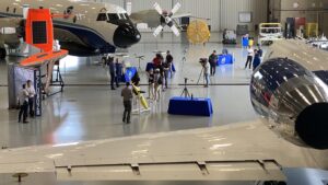 Media gathered on June 27 at the NOAA Aircraft Operations Center to tour Hurricane Hunter aircraft and learn about uncrewed systems used for hurricane research. Credit: NOAA