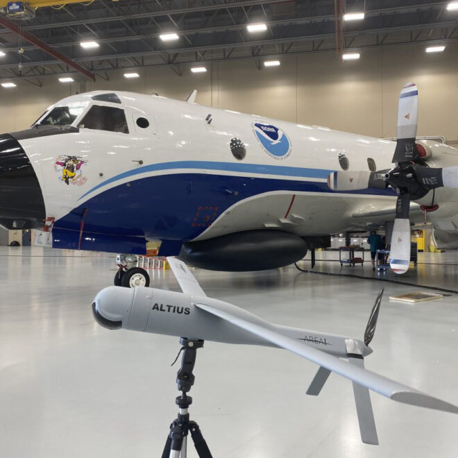 Altius demonstration model with Hurricane Hunter, NOAA WP-3D Orion “Miss Piggy,” at NOAA’s Aircraft Operations Center in Lakeland, FL during the second UAS flight test window on May 25, 2022. Photo Credit: NOAA/AOC Altius demonstration model with Hurricane Hunter, NOAA WP-3D Orion “Miss Piggy,” at NOAA’s Aircraft Operations Center in Lakeland, FL during the second UAS flight test window on May 25, 2022. Photo Credit: NOAA/AOC