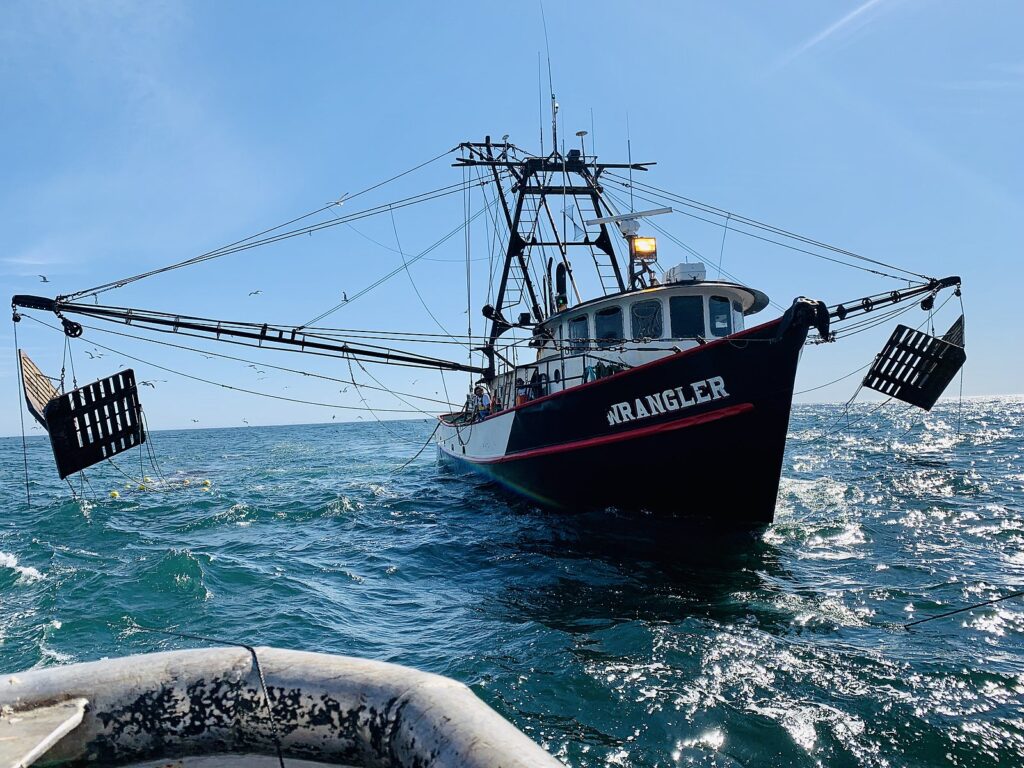 Shrimp trawler preparing to set gear off the coast of Oregon by WikiCommons.