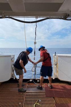 Retrieving the passive acoustic mooring to collect the data recordings. Credit: NOAA Fisheries/ Jonny Reid