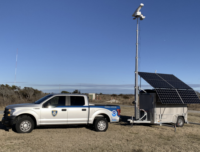 An M2 mobile radar unit shown here alongside a National Oceanic and Atmospheric Administration Office of Law Enforcement marked patrol vehicle, deployed during a vessel speed rule operation in the Mid-Atlantic region. NOAA photo.