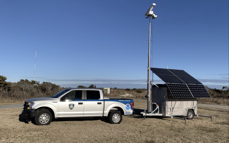 An M2 mobile radar unit shown here alongside a National Oceanic and Atmospheric Administration Office of Law Enforcement marked patrol vehicle, deployed during a vessel speed rule operation in the Mid-Atlantic region. NOAA photo.