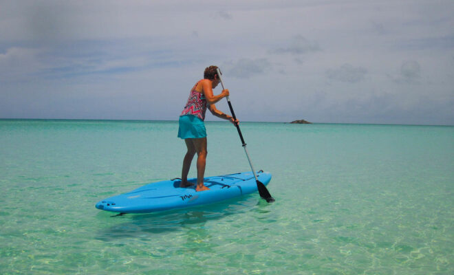 Trying the paddle board by Flickr.