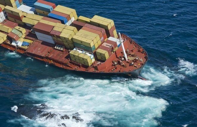 Grounded ship Rena on the Astrolabe reef by Splash247.