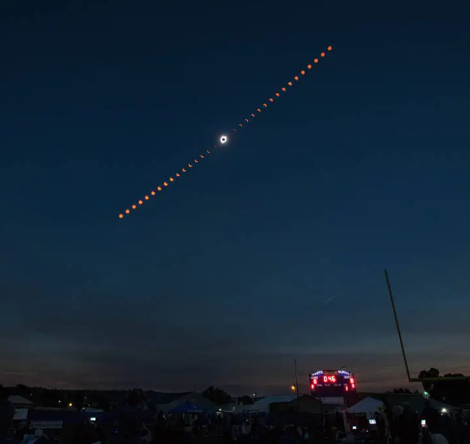 This composite image shows the progression of a total solar eclipse over Madras, Oregon, on Aug. 21, 2017. Credit: NASA/Aubrey Gemignani