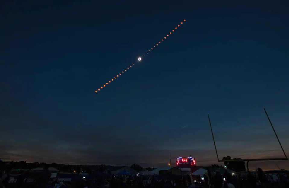 This composite image shows the progression of a total solar eclipse over Madras, Oregon, on Aug. 21, 2017. Credit: NASA/Aubrey Gemignani