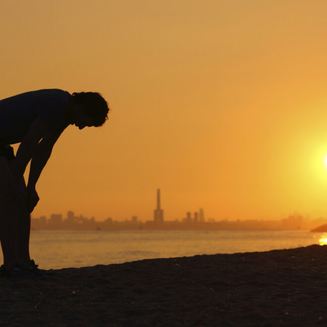 Silhouette of a person at sunset during a heatwave. (Image credit: iStock)