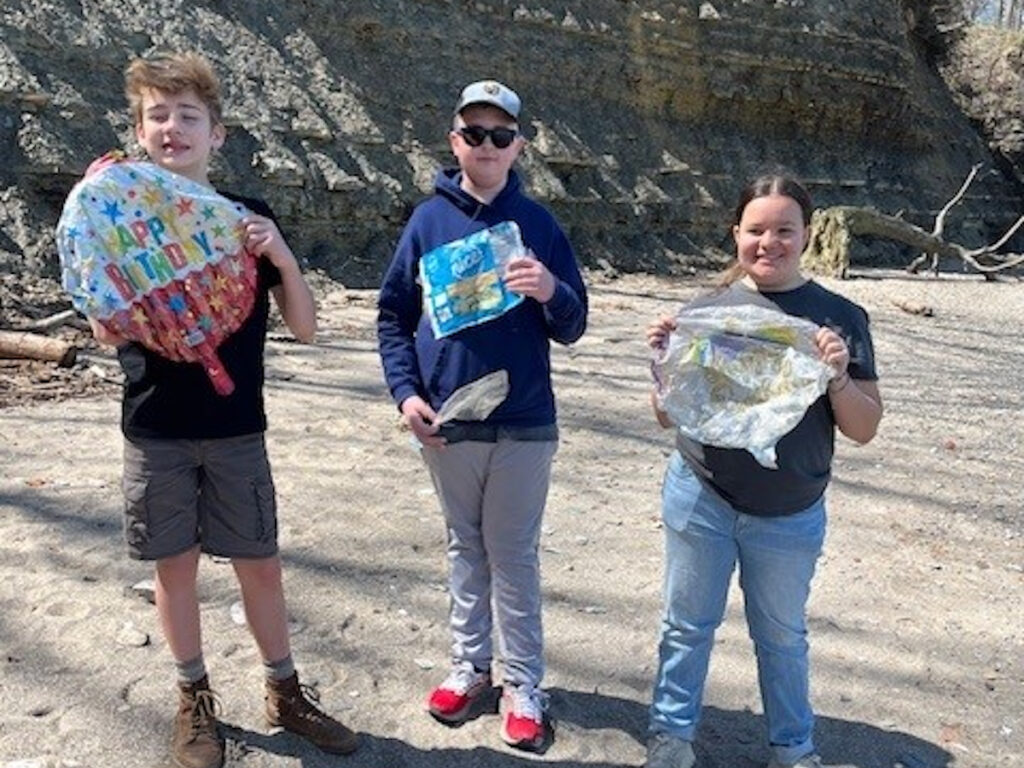 Local Sea Scouts picking up debris from a public beach in Bay Village, Ohio.