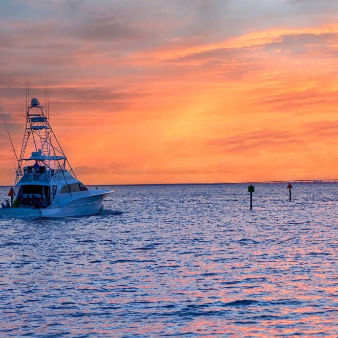 Sport Fishing Boat leaving the harbor at sunrise, Florida