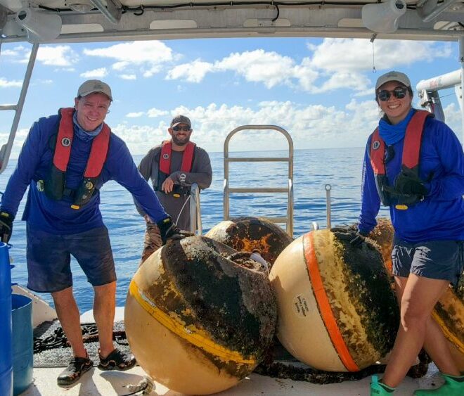 The NOAA Florida Keys National Marine Sanctuary Buoy Team performs maintenance on boundary buoys for Carysfort Reef Sanctuary Preservation Area. Photo: Brittany Torres/NOAA