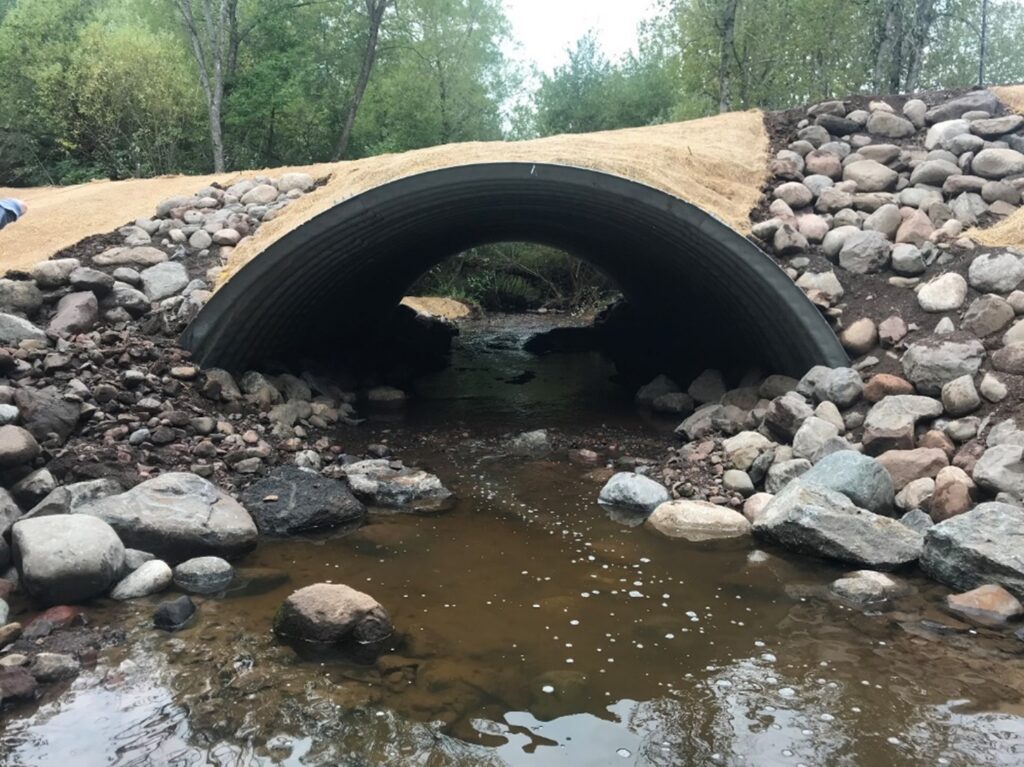 With the newly installed culvert in place, fish, sediment, and water can pass through unimpeded.