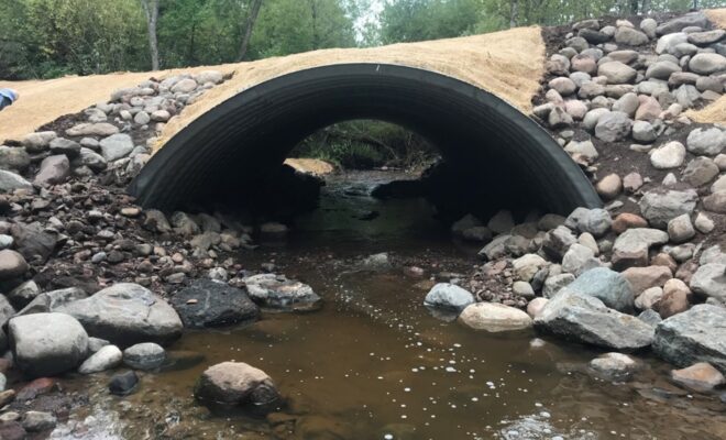 With the newly installed culvert in place, fish, sediment, and water can pass through unimpeded.