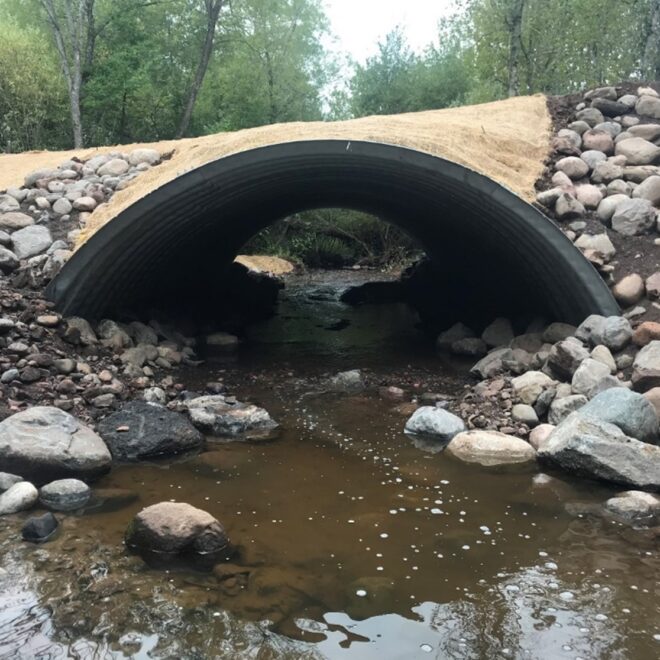 With the newly installed culvert in place, fish, sediment, and water can pass through unimpeded.