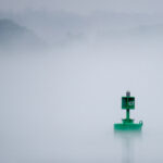 Navigation Aid, buoy, in the fog. Photo by Andrew Marek/Shutterstock