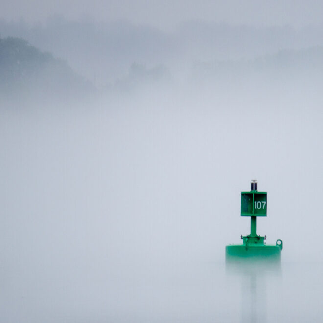Navigation Aid, buoy, in the fog. Photo by Andrew Marek/Shutterstock