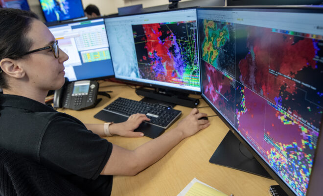 A meteorologist with NOAA’s National Weather Service reviews atmospheric data as part of the Advanced Weather Interactive Processing System (AWIPS), software that enables forecasters to analyze data, and issue forecasts and alerts. (Image credit: Robert Hyatt/NOAA NWS)