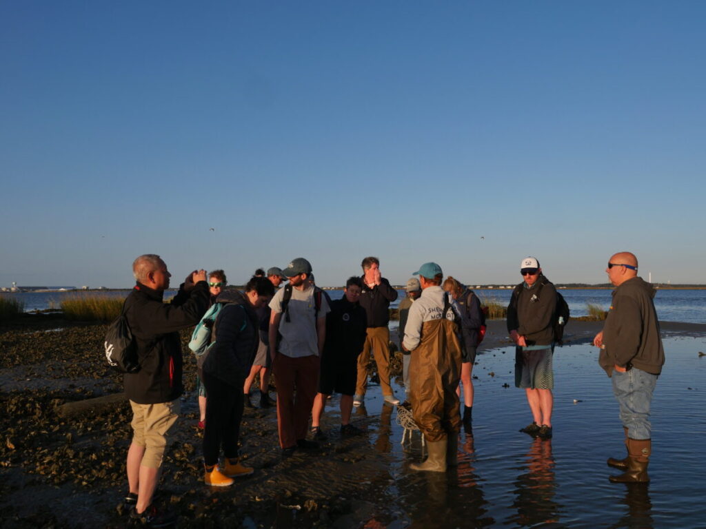 Sea Grant Aquaculture Leadership Academy participants tour a Sandbar Oyster Company oyster and salt marsh restoration project North Carolina. (Photo by LaDon Swann)