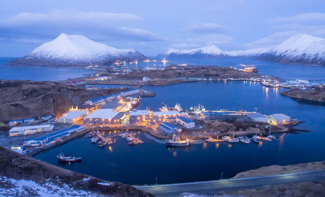 A Bering Sea pollock fleet prepares to depart Dutch Harbor, Alaska, for another season of the largest commercial fishery in the United States. (Image credit: S. Zmolek/NOAA)