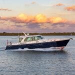 The Sabre 51 cruising the intracoastal waterway at sunset.