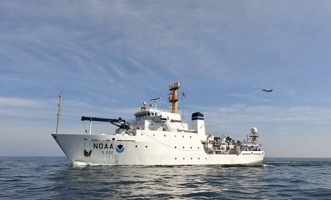 NOAA Ship Thomas Jefferson mapping off the coast of Cleveland, Ohio, in 2022, along with a NOAA plane collecting lidar data. (LCDR Michelle Levano/NOAA)