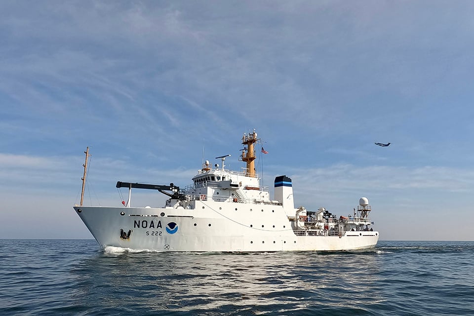 NOAA Ship Thomas Jefferson mapping off the coast of Cleveland, Ohio, in 2022, along with a NOAA plane collecting lidar data. (LCDR Michelle Levano/NOAA)