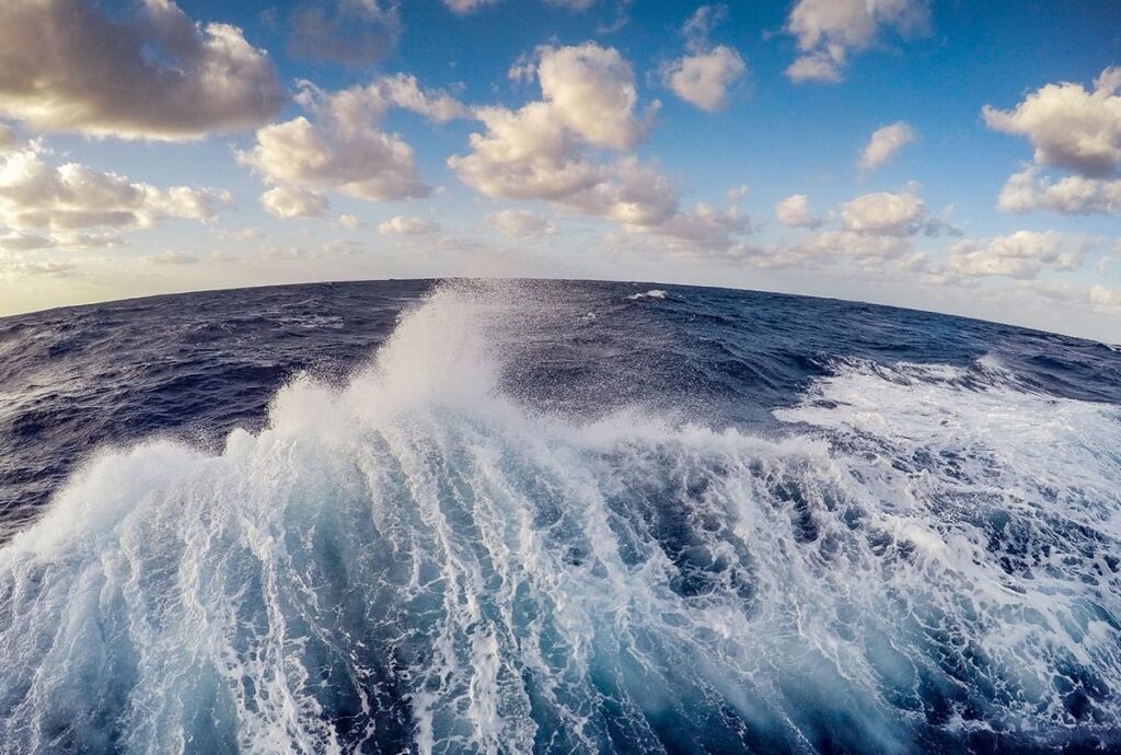 A fish-eye view of the wake of a ship out at sea. Here's an ocean fact: The surface layer of the ocean is teeming with photosynthetic plankton. Though they're invisible to the naked eye, they produce more oxygen than the largest redwood trees. (Image credit: NOAA)