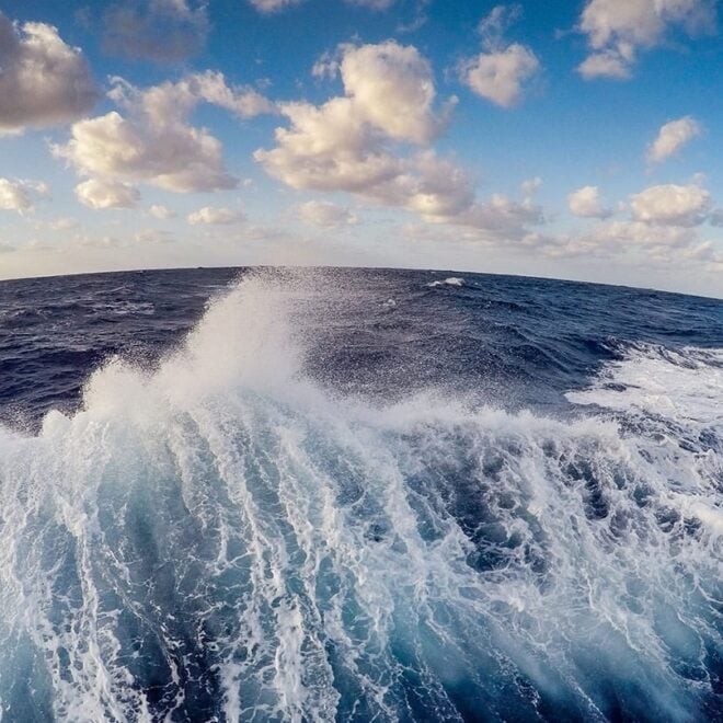 A fish-eye view of the wake of a ship out at sea. Here's an ocean fact: The surface layer of the ocean is teeming with photosynthetic plankton. Though they're invisible to the naked eye, they produce more oxygen than the largest redwood trees. (Image credit: NOAA)