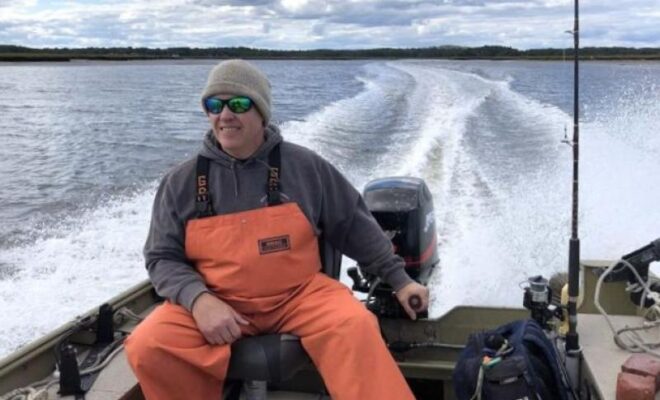 Brenden Doyle, the founder and owner of The Great Marsh Shellfish Company, grows oysters in the largest contiguous salt marsh in New England. Credit: The Great Marsh Shellfish Company