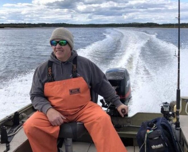 Brenden Doyle, the founder and owner of The Great Marsh Shellfish Company, grows oysters in the largest contiguous salt marsh in New England. Credit: The Great Marsh Shellfish Company