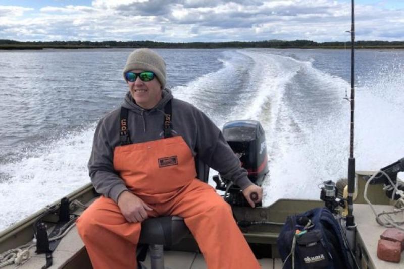 Brenden Doyle, the founder and owner of The Great Marsh Shellfish Company, grows oysters in the largest contiguous salt marsh in New England. Credit: The Great Marsh Shellfish Company
