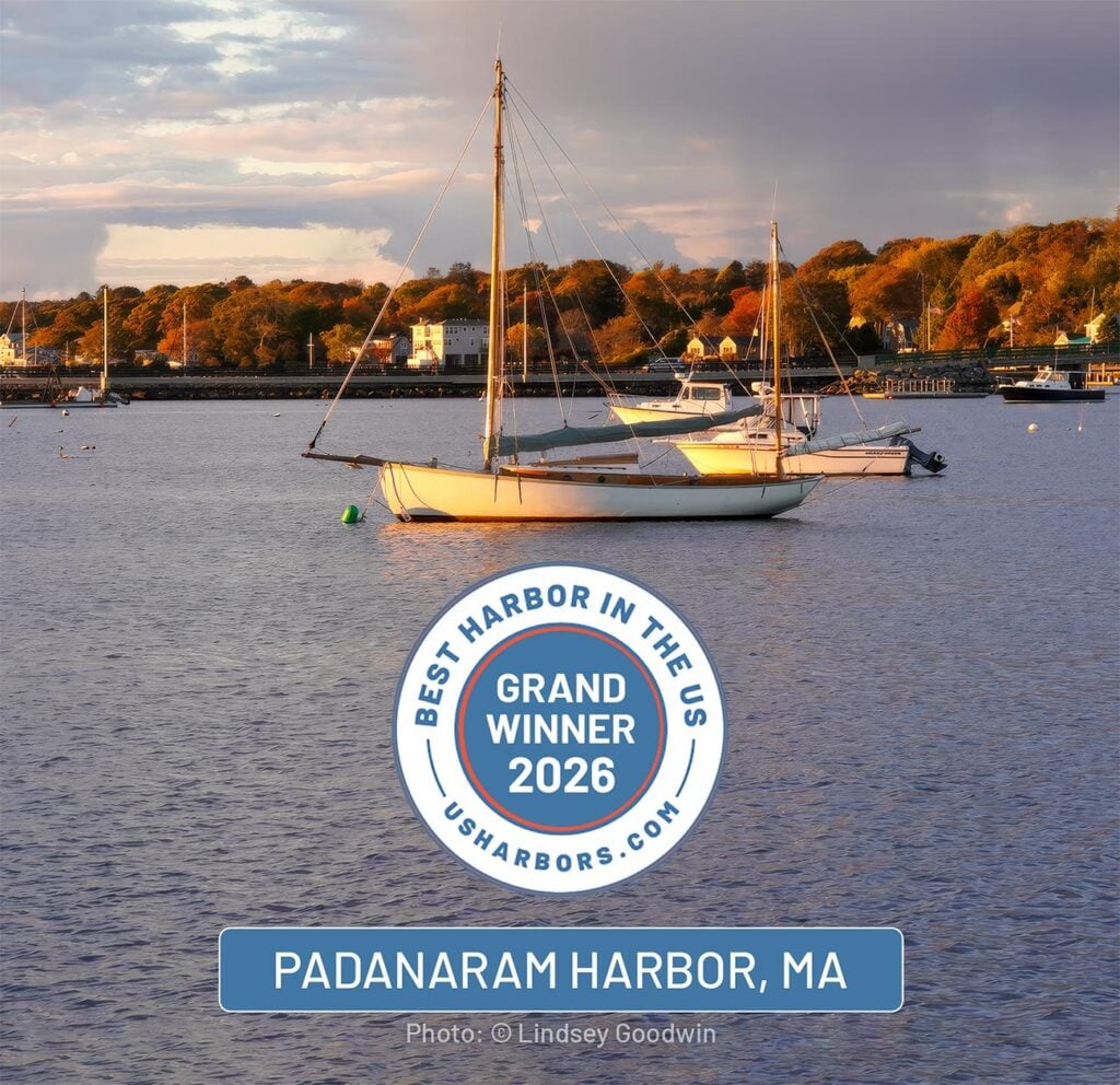 Sailboat moored in Padanaram Harbor, South Dartmouth, MA at sunset