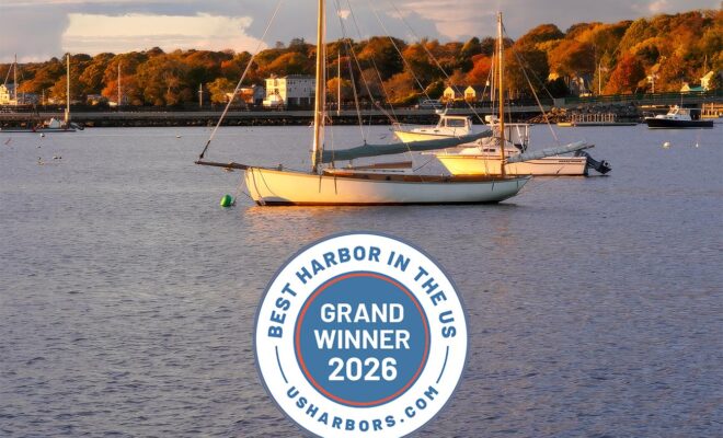 Sailboat moored in Padanaram Harbor, South Dartmouth, MA at sunset