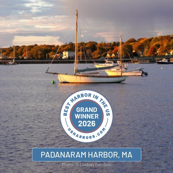 Sailboat moored in Padanaram Harbor, South Dartmouth, MA at sunset