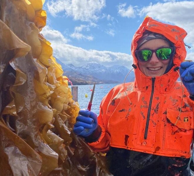 Adelia Myrick harvesting kelp on her farm in Kodiak, Alaska.