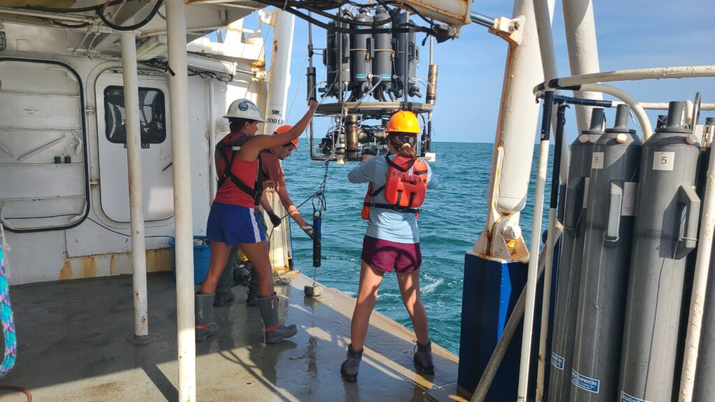 Measuring a 'dead zone': Scientists retrieve the CTD (conductivity, temperature, depth) package of ocean sensors after profiling dissolved oxygen at a station during the Shelfwide Hypoxia Cruise in the Gulf of America. (Image credit: Courtesy of Cassandra Glaspie/LSU)